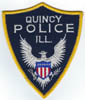 QUINCYILPOLICETMB