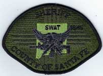 SANTAFECONMSHERIFFSWATBLACKONGREENSTD