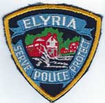 Elyria, Ohio  Police  (Old Style, Sewn in border, Red in Buildings)