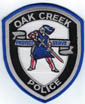 OAKCREEKWIPOLICETMB